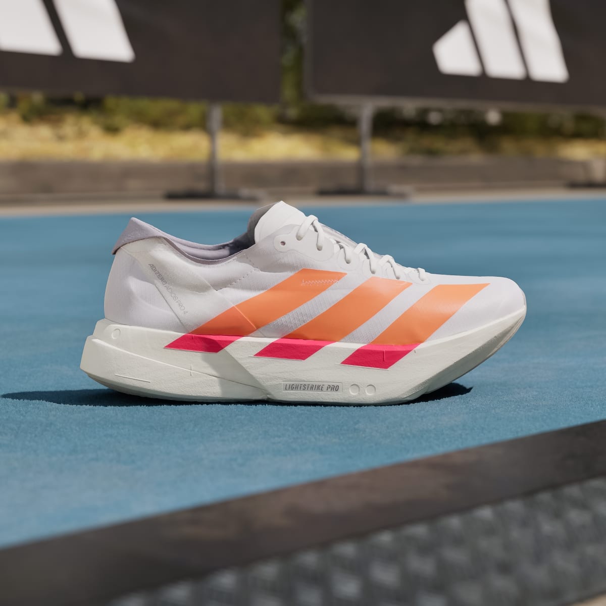 Adidas Adizero Adios Pro 4 Sneakers - Cloud White / Lucid Orange / Lucid Red - view 3