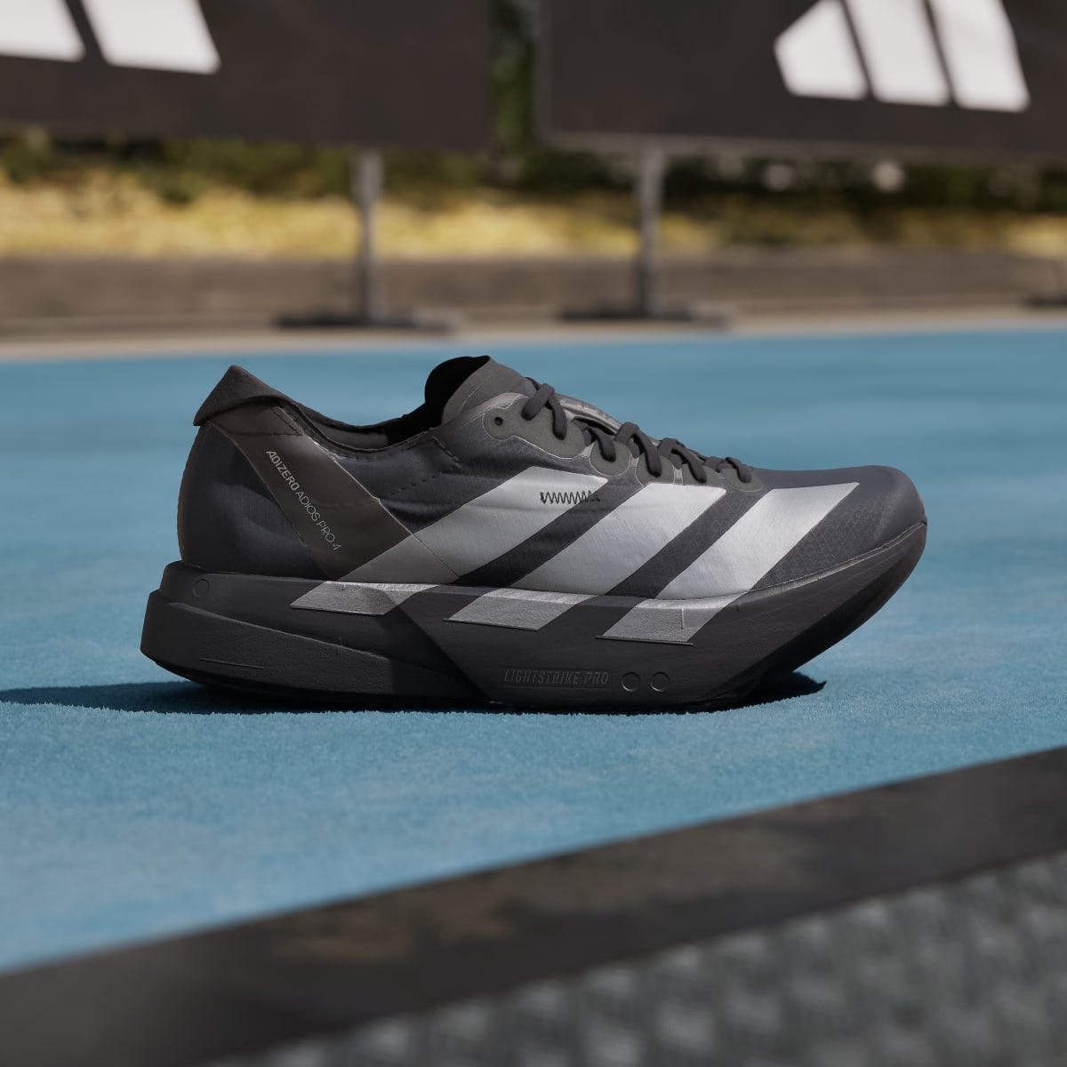 Adidas Adizero Adios Pro 4 Sneakers - Core Black / Iron Metallic / Carbon - view 3
