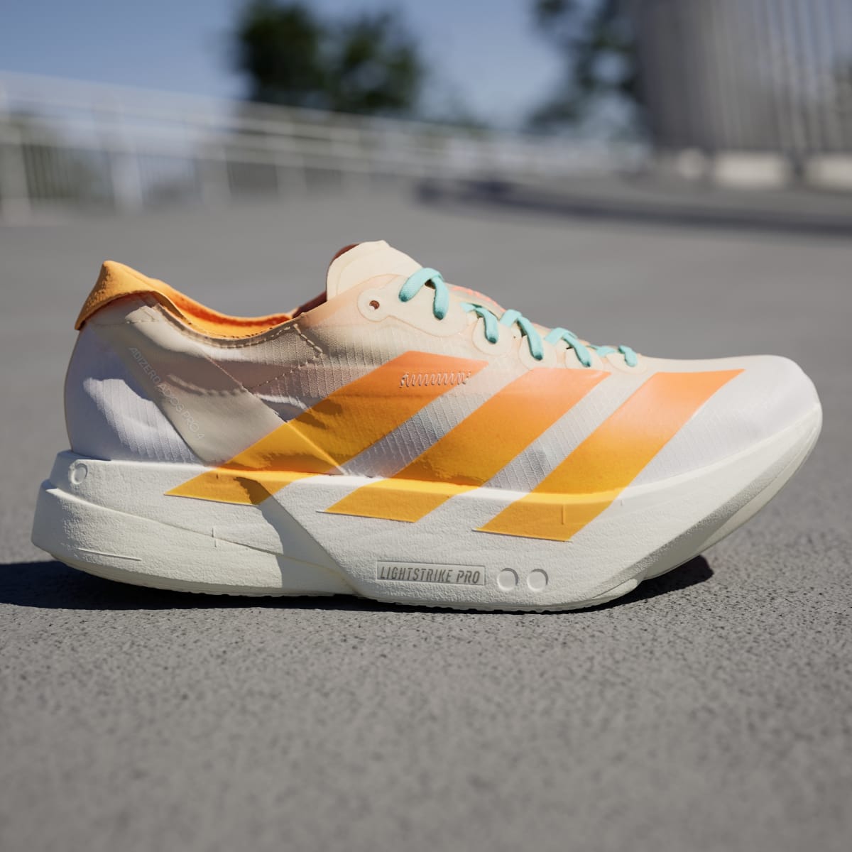 Adidas Adizero Adios Pro 4 Sneakers - Crystal Sand / Flash Orange / Flash Aqua - view 3