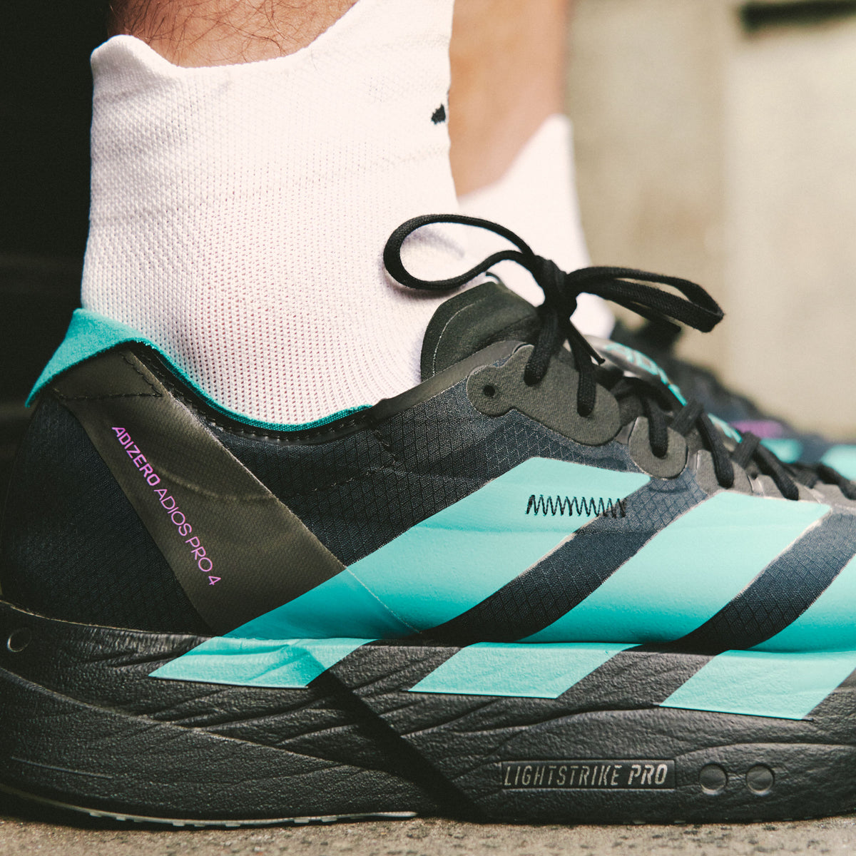 Adidas Adizero Adios PRO 4 M Sneakers - Black / Pure Teal / Magic Purple - view 2