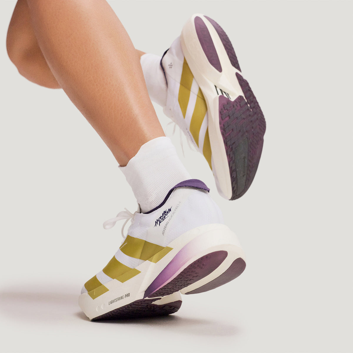 Adidas Adizero Adios PRO 4 Sneakers - White / Gold / Aurora Plum - view 6