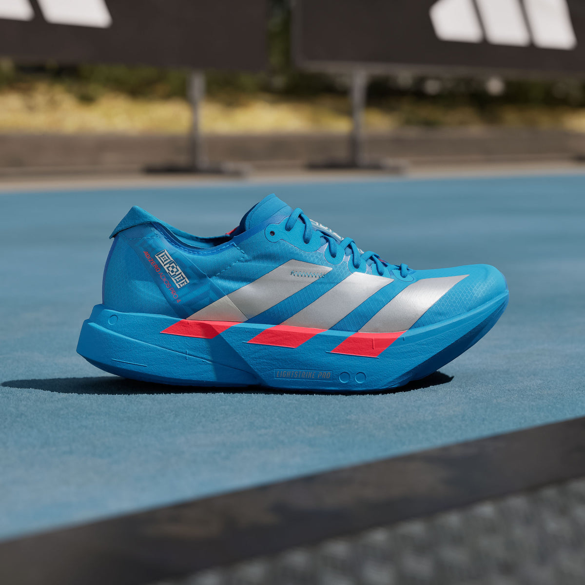 Adidas Adizero Adios PRO 4 W Sneakers - Silver Metallic / Bright Red - view 1